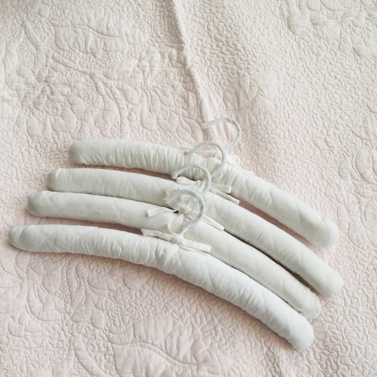 Set of 4 Coat Hangers - White